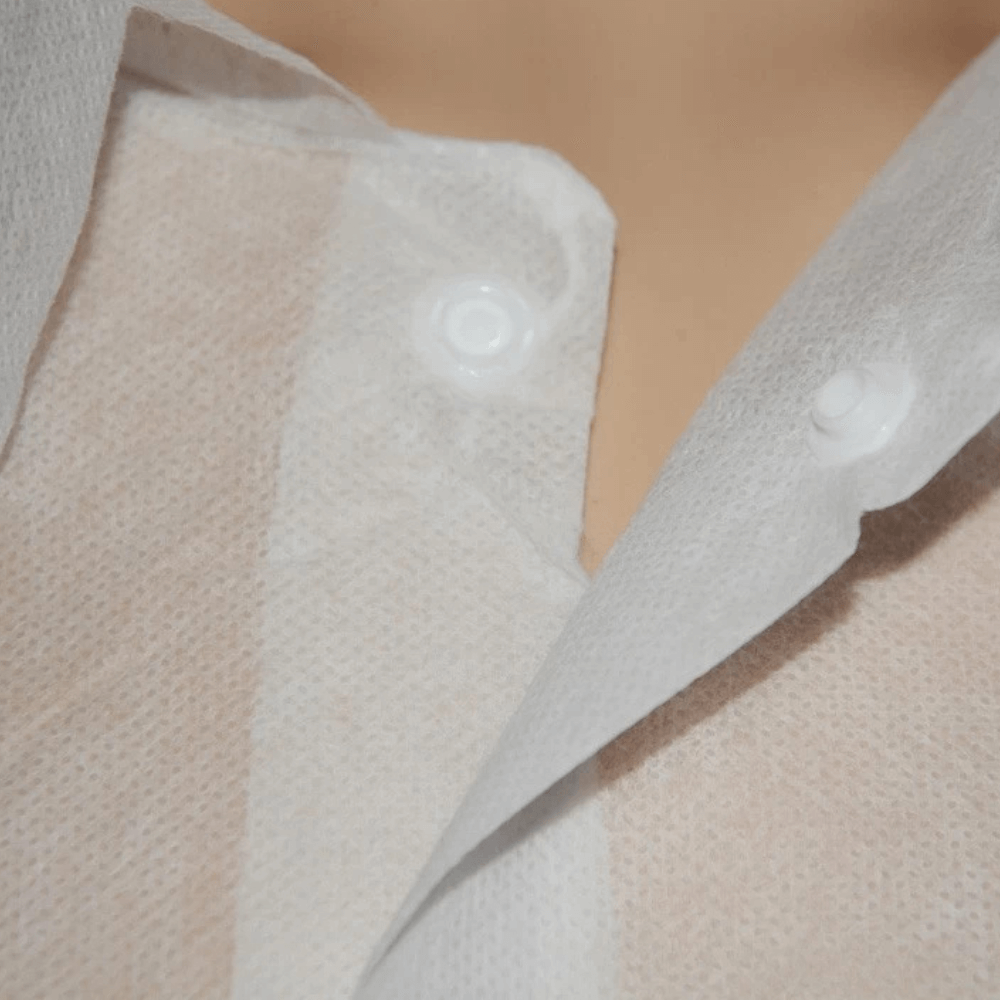 disposable white lab coat with button
