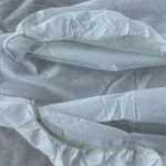 white disposable massage table fitted sheets