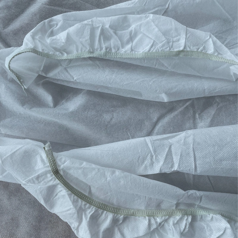 white disposable massage table fitted sheets